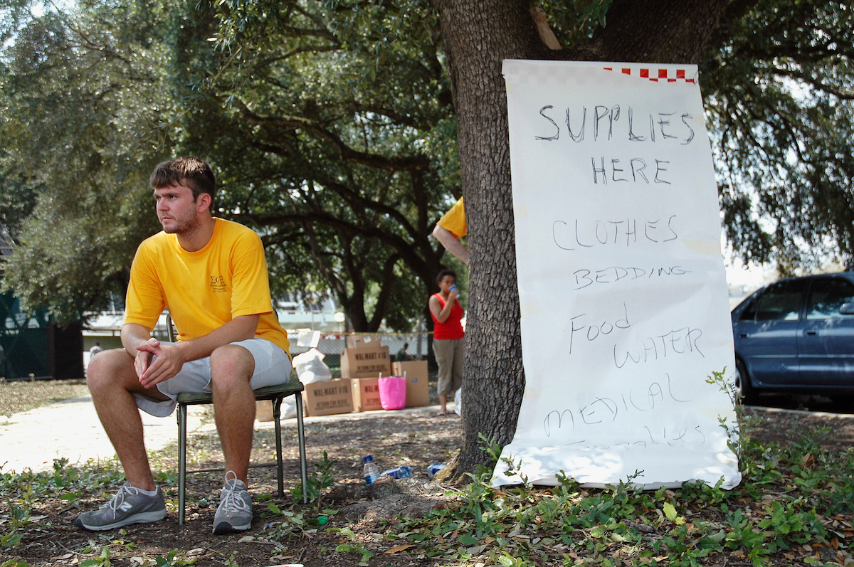 LSU student Matthew Giglia staffs a supply distribution site on campus.